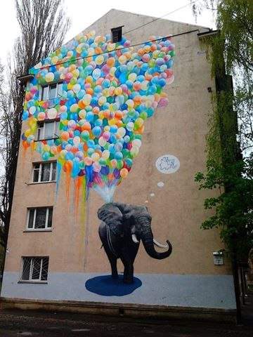 На одном из киевских домов появился стрит-арт в стиле известной украинской художницы (фото)